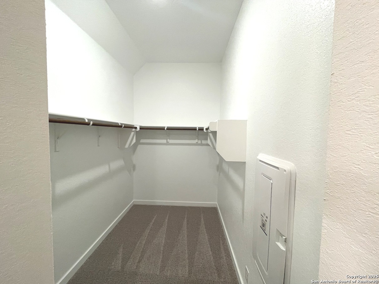 116 Radnor Road New Braunfels, TX 78130 - Photo 15 of 26 a view of a room with racks on the wall