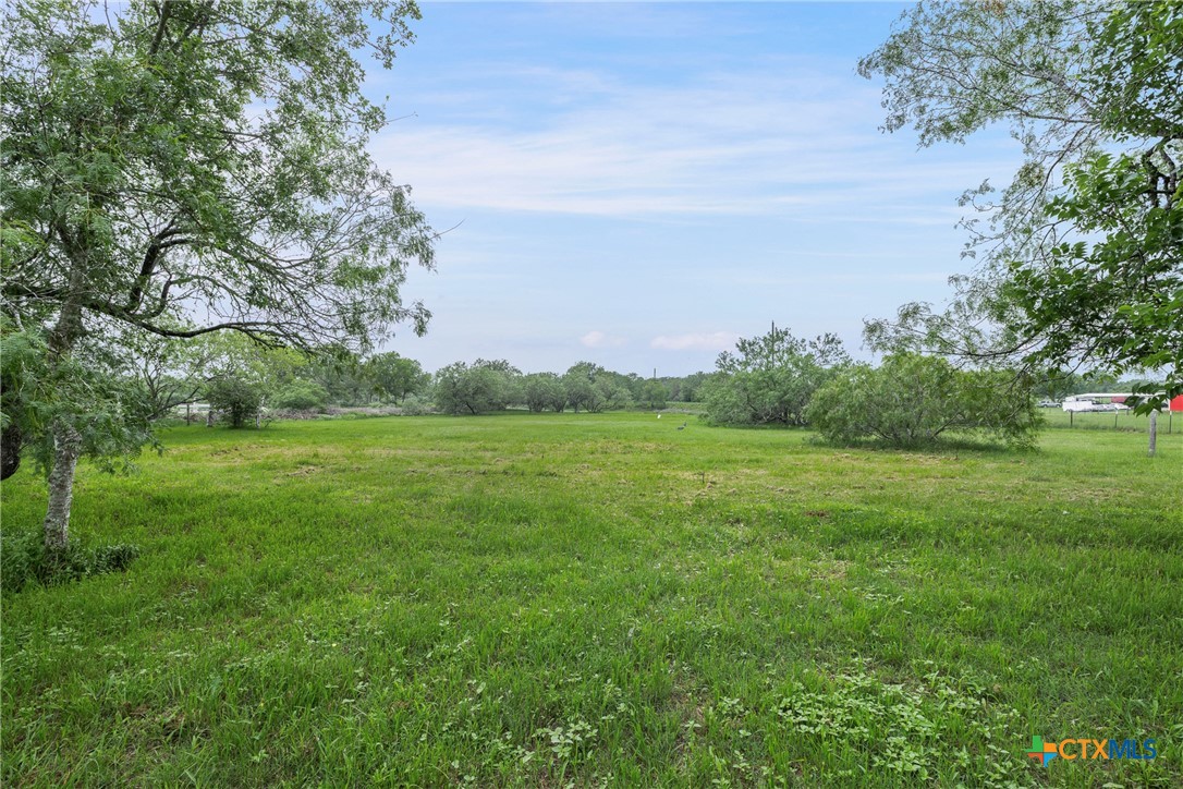 6497 Taylorsville Road Dale, TX 78616 - Photo 20 of 36 a yard with lots of green space