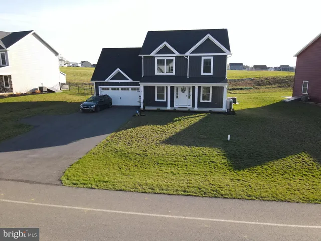 a view of a house with a ocean view