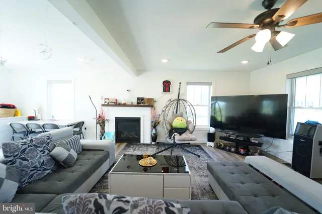 a kitchen with a refrigerator a stove a microwave and cabinets