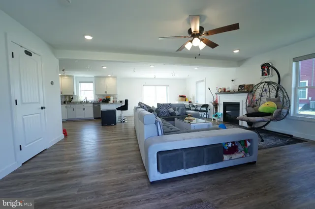 an aerial view of a house with pool ocean view