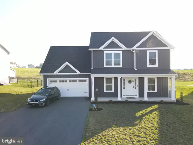 a view of a ocean with lawn chairs