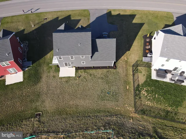 a view of houses with an outdoor space and lakeside