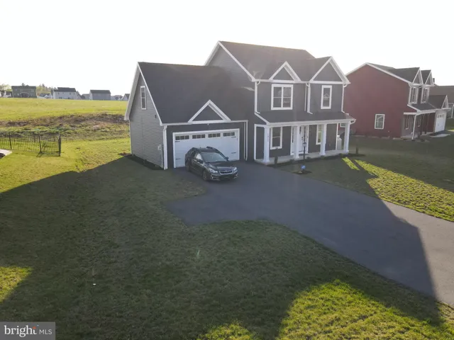 a view of a house with a ocean view