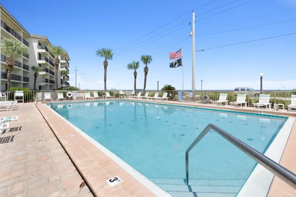 a view of a kitchen with a swimming pool