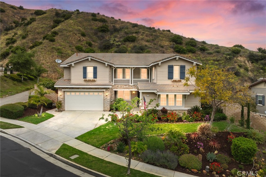 a view of a house with a garden