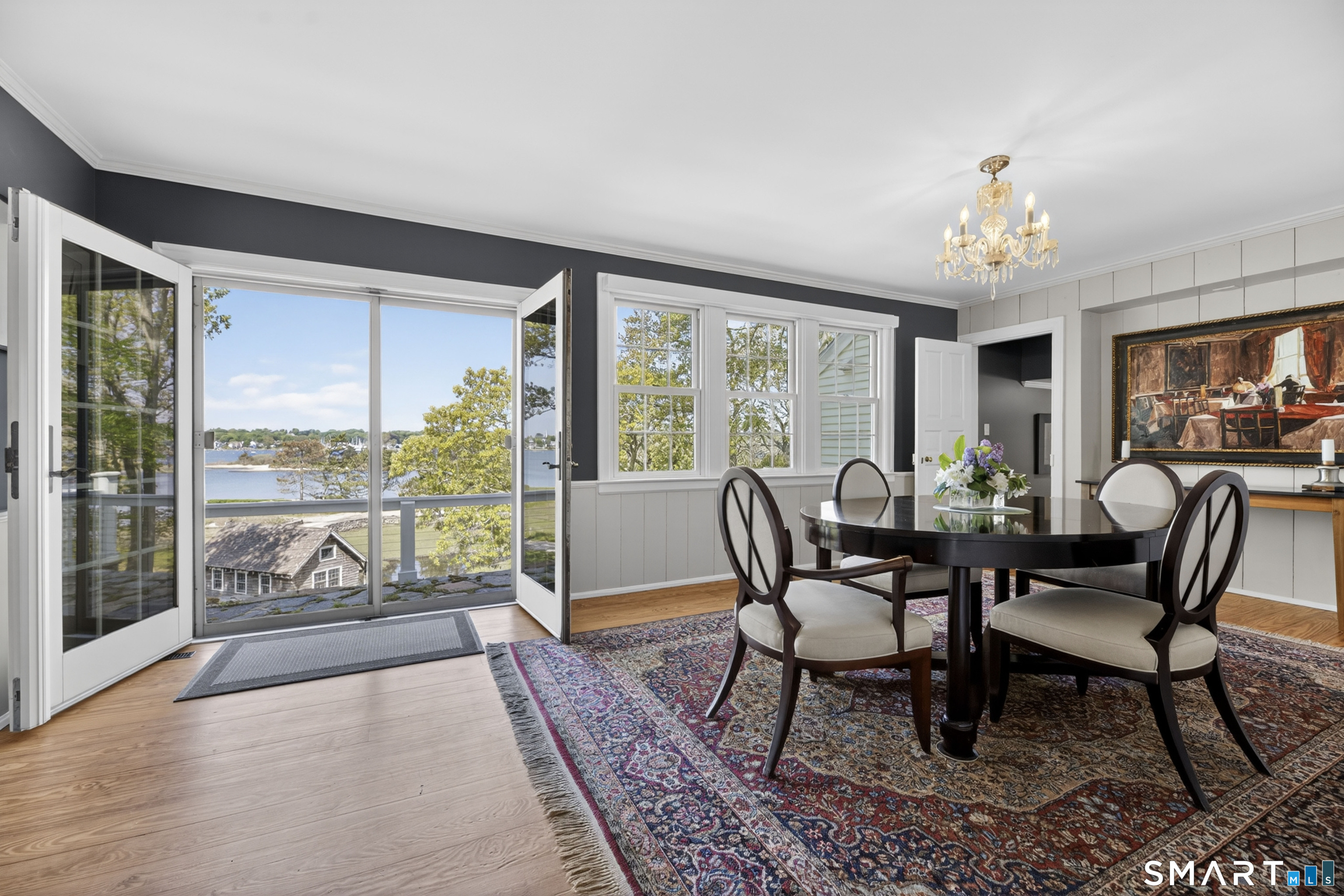 32 Money Point Road Stonington, CT 06355 - Photo 6 of 40 a view of a dining room with furniture window and outside view