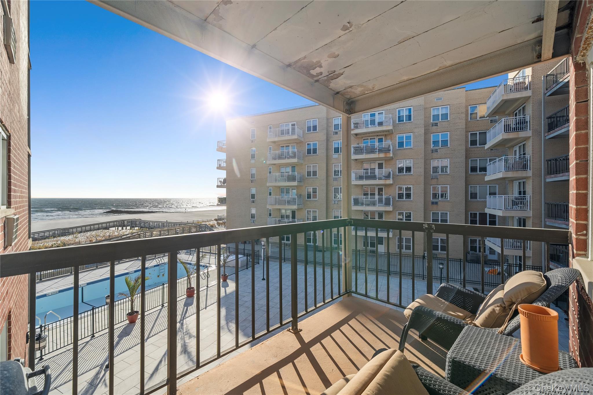 750 Shore Road, Unit 3O Long Beach, NY 11561 - Photo 16 of 23 a view of a balcony with chair