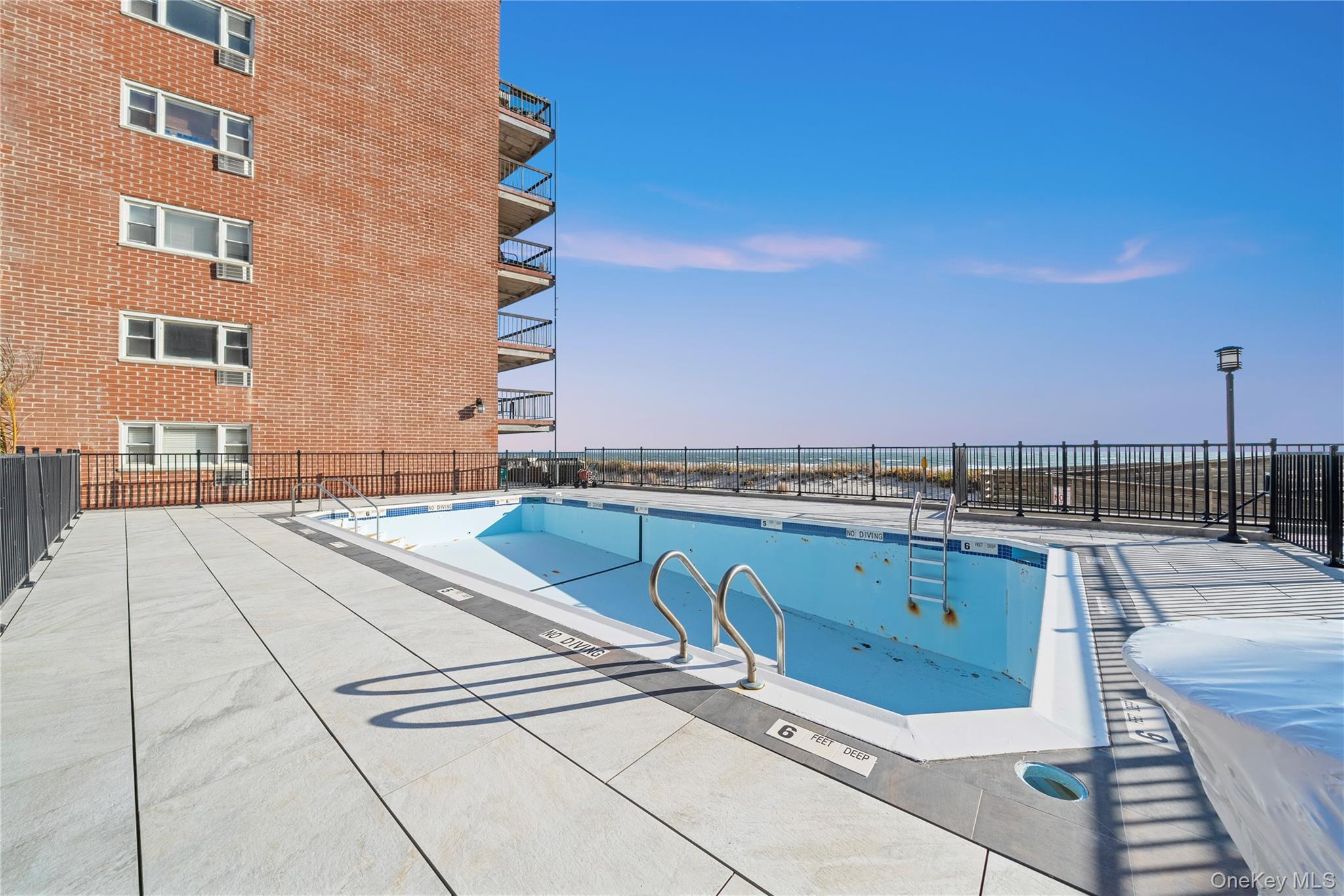 750 Shore Road, Unit 3O Long Beach, NY 11561 - Photo 21 of 23 a view of a terrace with seating space