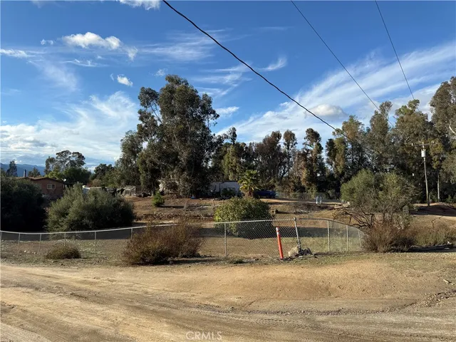 a view of swimming pool with outdoor seating and plants