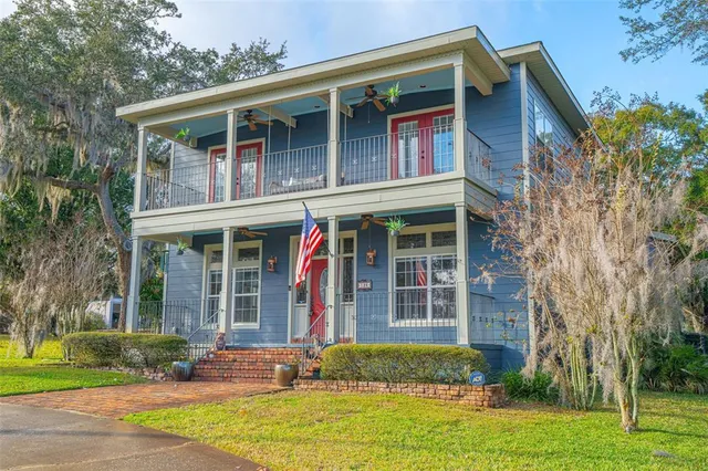 a front view of a building with a door and a window