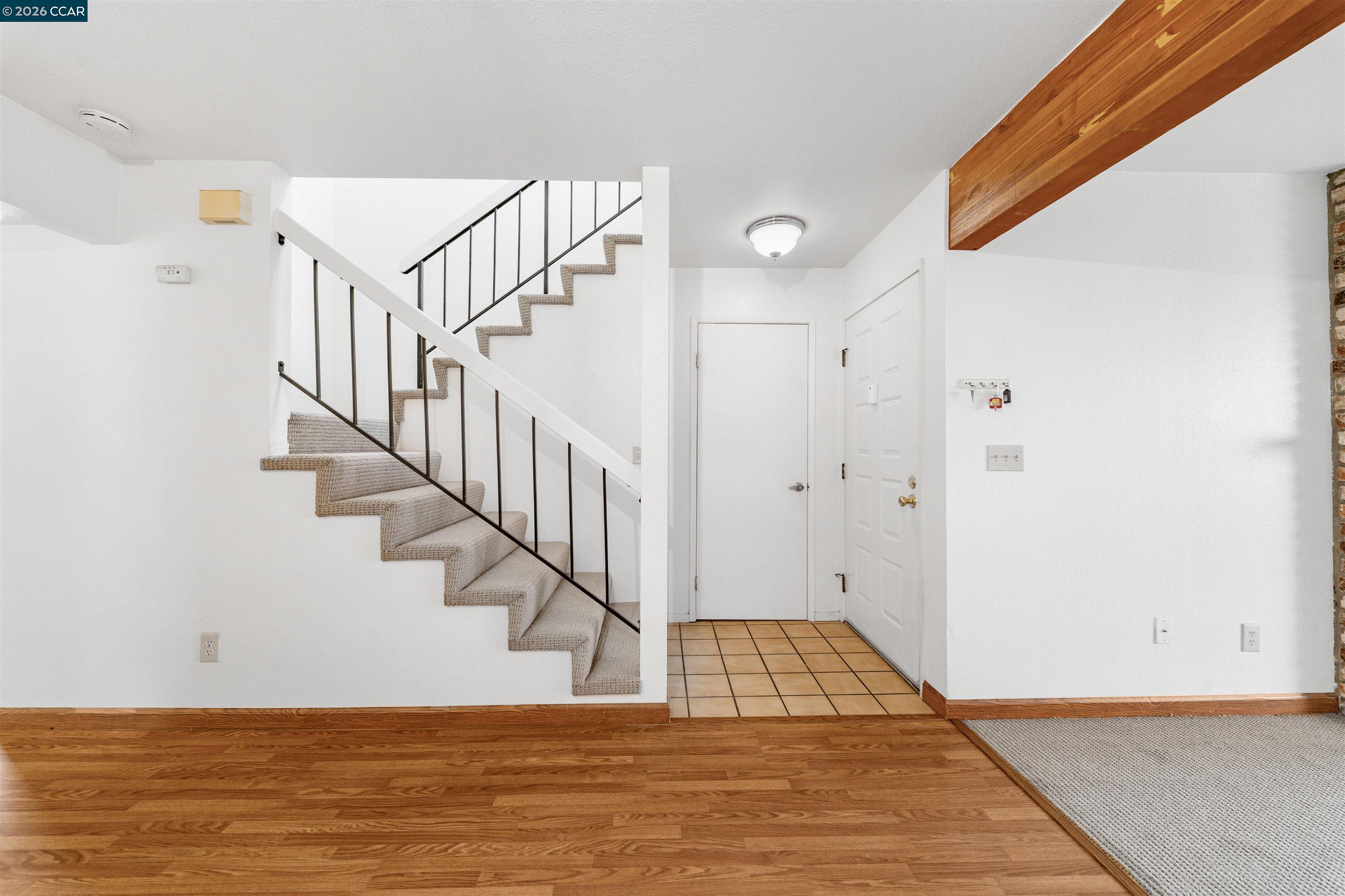 2055 Sierra Road, Unit 106 Concord, CA 94518 - Photo 6 of 37 a view of entryway and hall with wooden floor