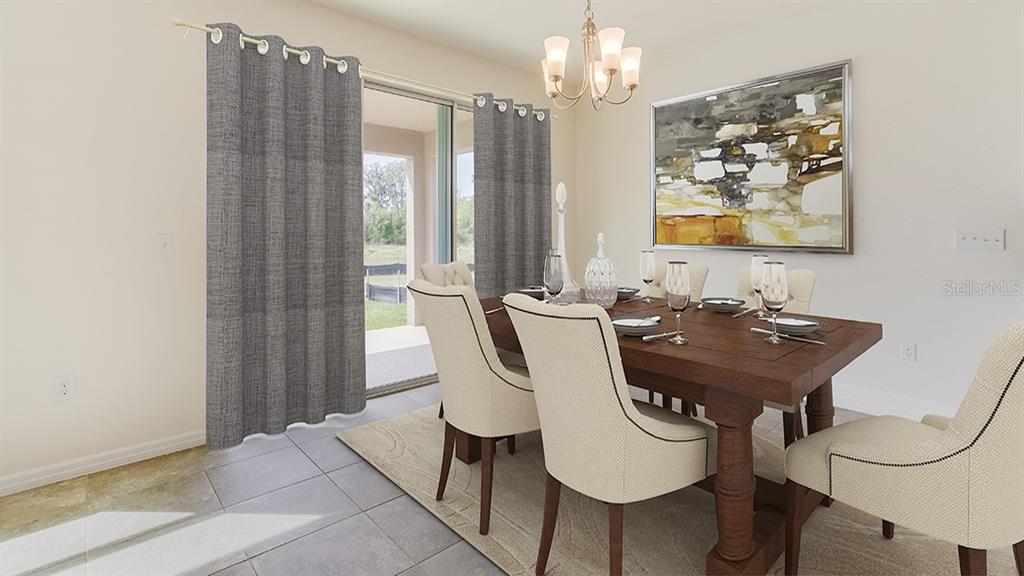 17536 Maple Grv Road Land O Lakes, FL 34638 - Photo 5 of 15 a view of a dining room with furniture and chandelier