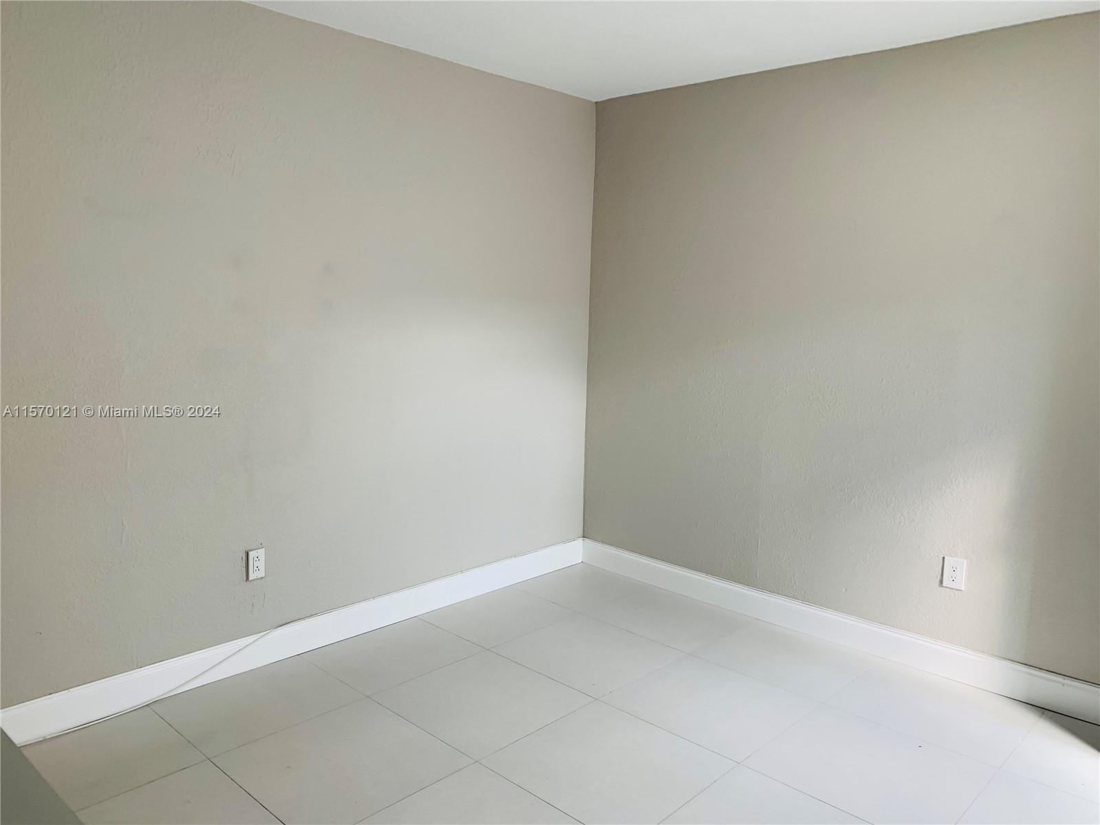 1265 Southwest 6th Street, Unit 13 Miami, FL 33135 - Photo 4 of 7 a view of an empty room