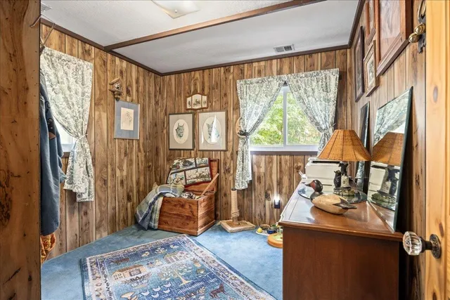 a view of a balcony with wooden floor