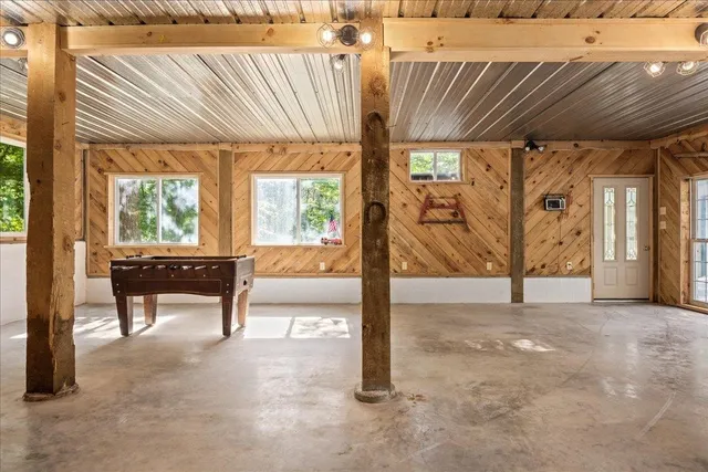 a view of outdoor space with deck and trees