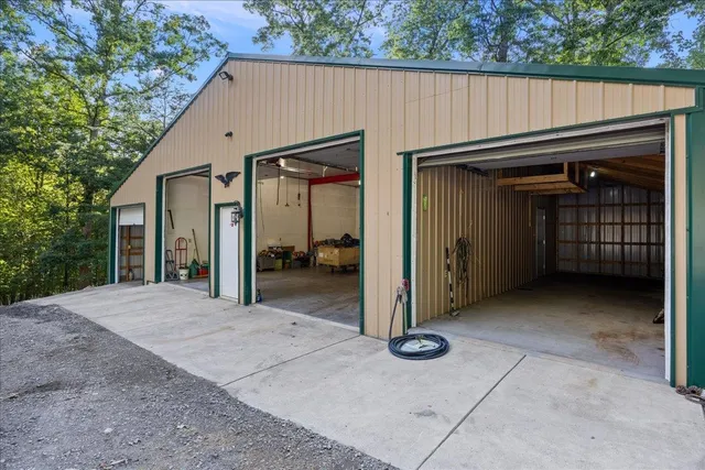 an aerial view of a house with outdoor space