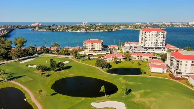 a view of a swimming pool with a lounge chair