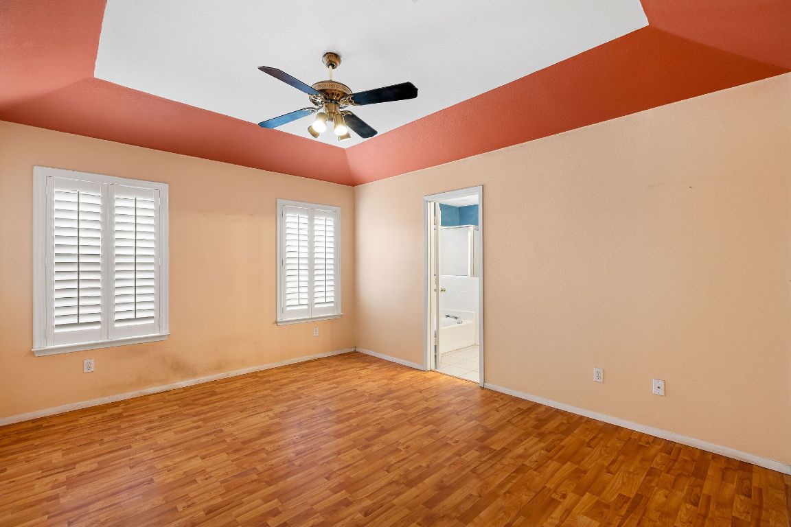 112 Amherst Court Kyle, TX 78640 - Photo 13 of 38 a view of an empty room with a window