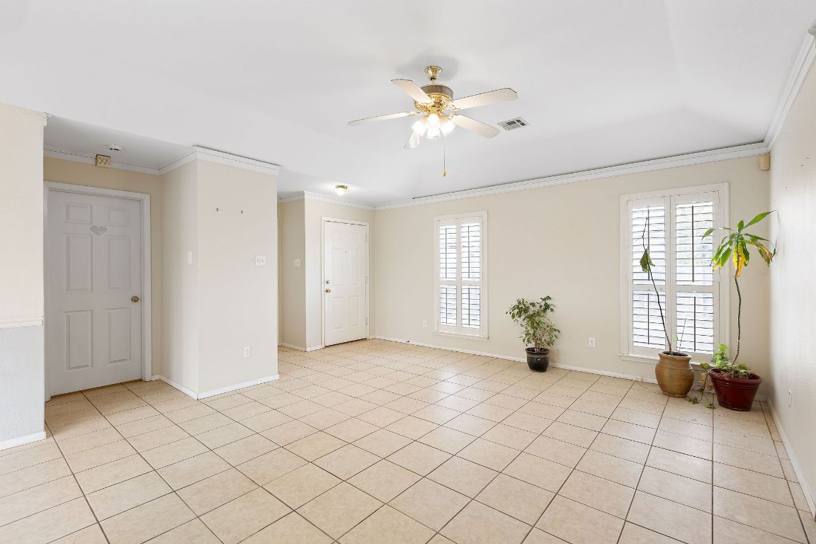112 Amherst Court Kyle, TX 78640 - Photo 7 of 38 a view of an empty room with a window