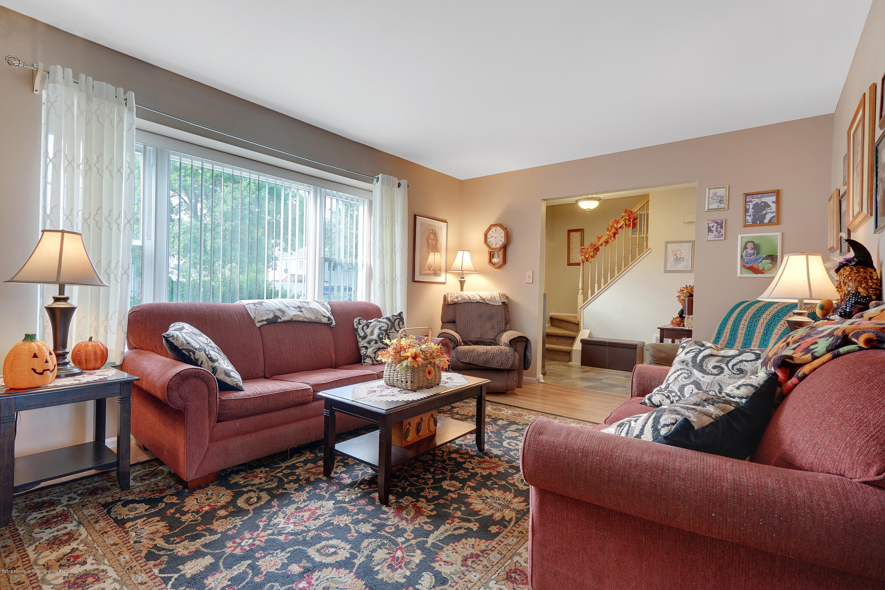 123 Reflection Road Toms River, NJ 08753 - Photo 16 of 41 a living room with furniture and a large window
