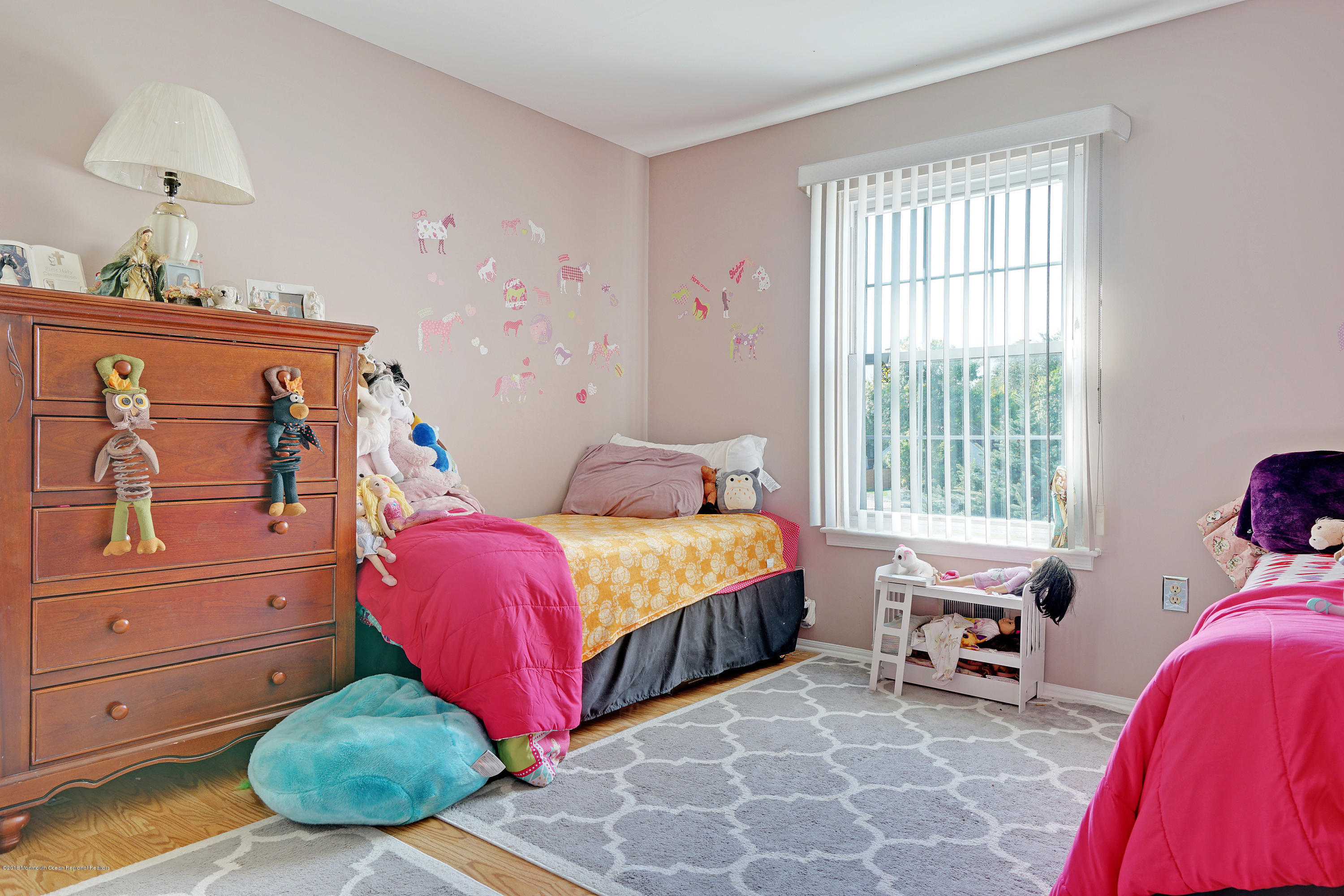 123 Reflection Road Toms River, NJ 08753 - Photo 36 of 41 a bedroom with a bed and window