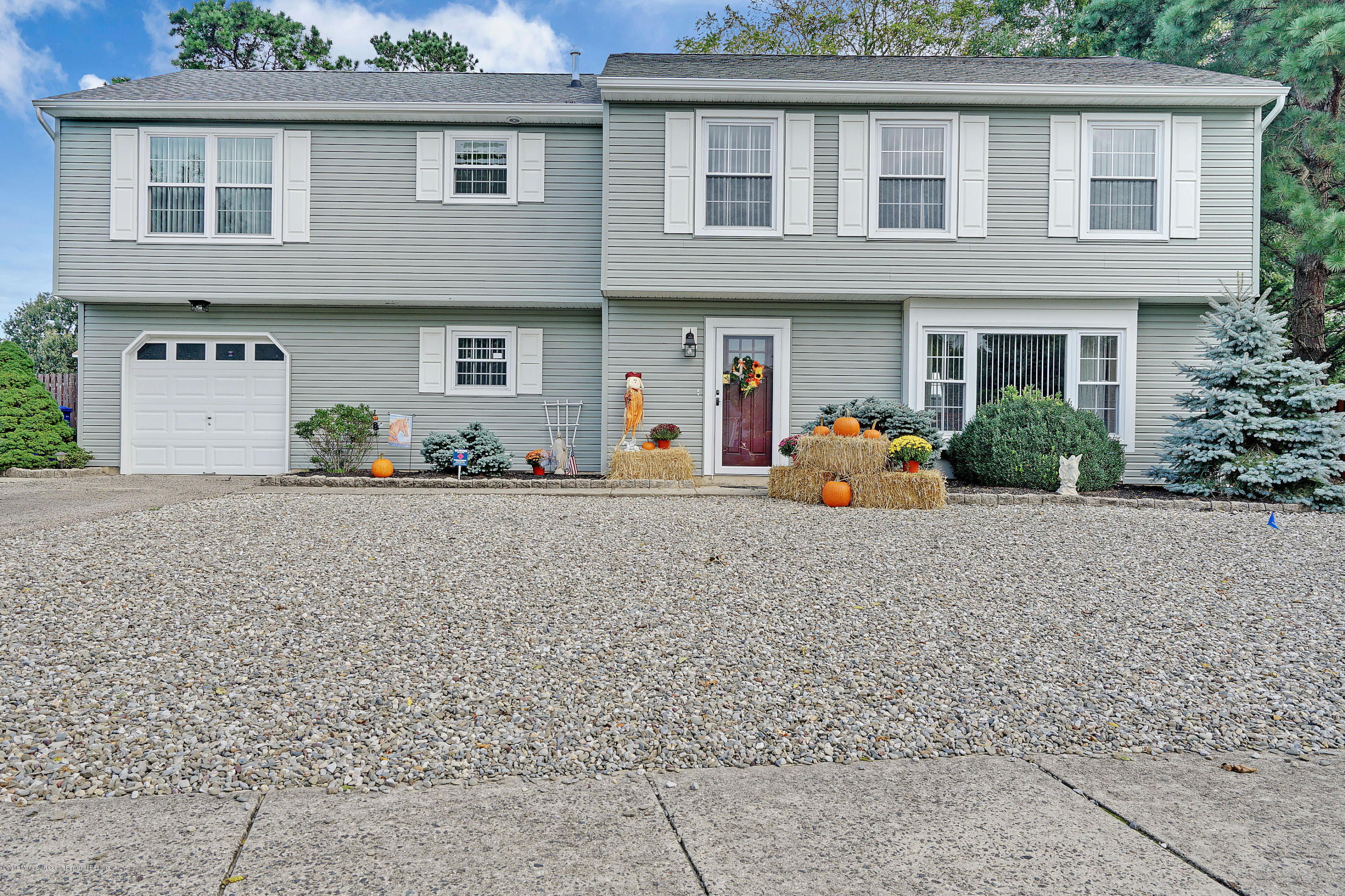 123 Reflection Road Toms River, NJ 08753 - Photo 4 of 41 a front view of a house