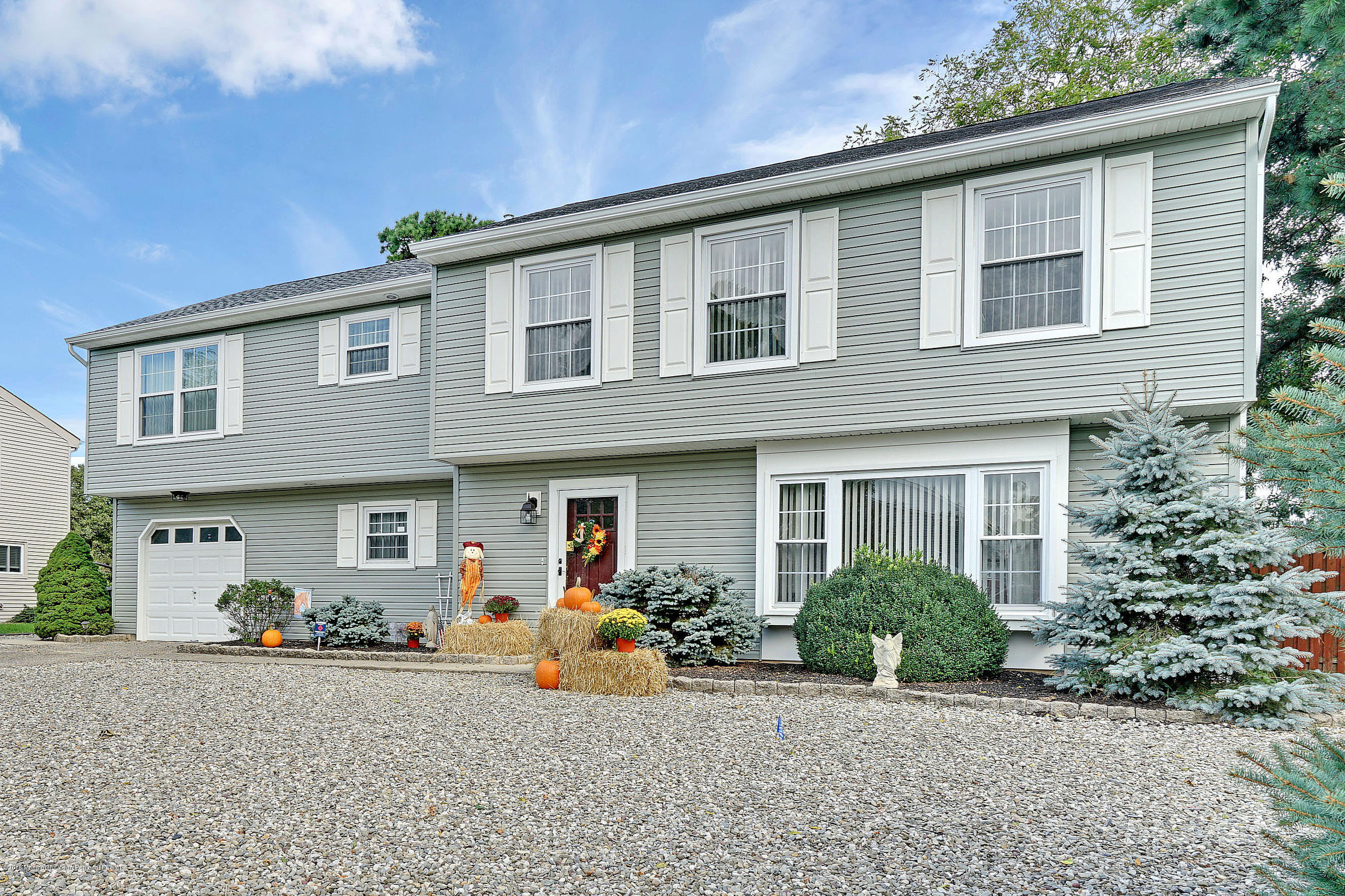 123 Reflection Road Toms River, NJ 08753 - Photo 6 of 41 a view of a house with a patio