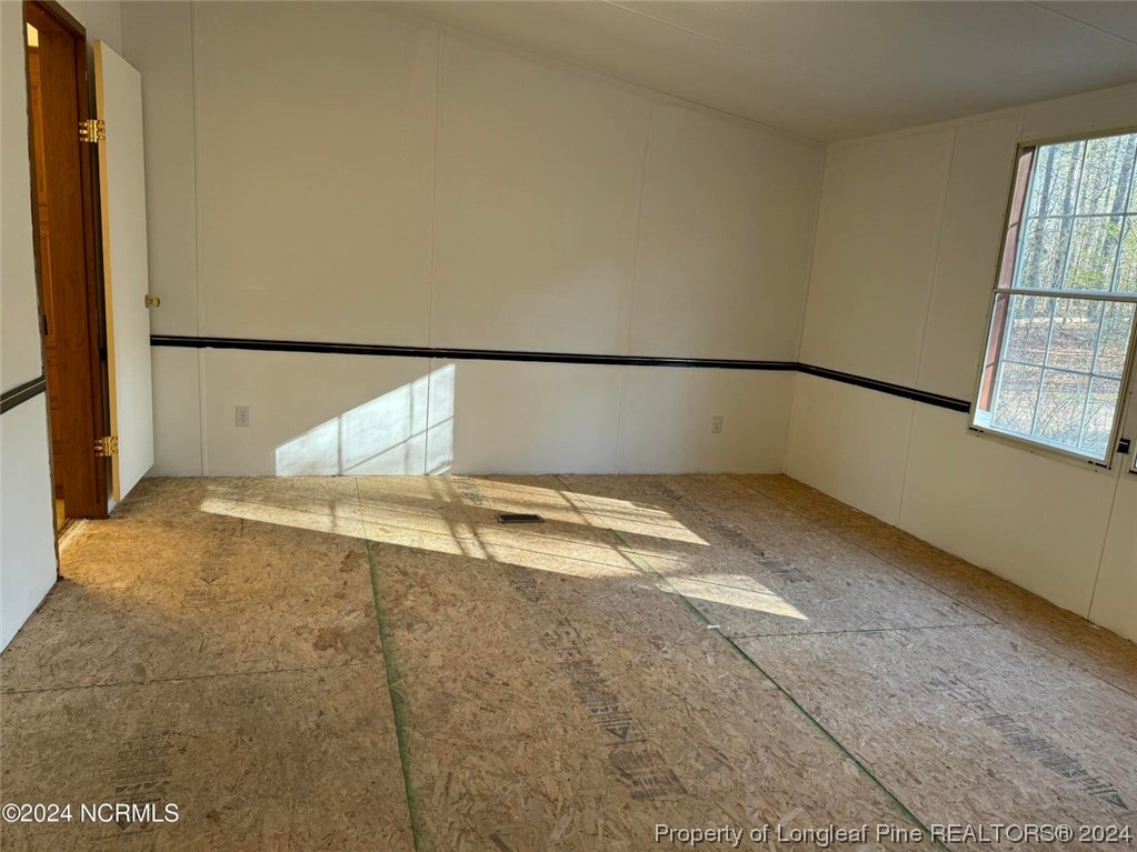 2352 County Line Road Cameron, NC 28326 - Photo 24 of 38 a view of a bathtub in a room