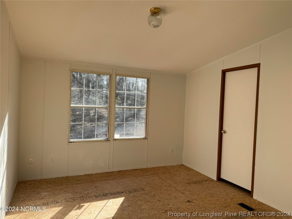 2352 County Line Road Cameron, NC 28326 - Photo 34 of 38 an empty room with windows