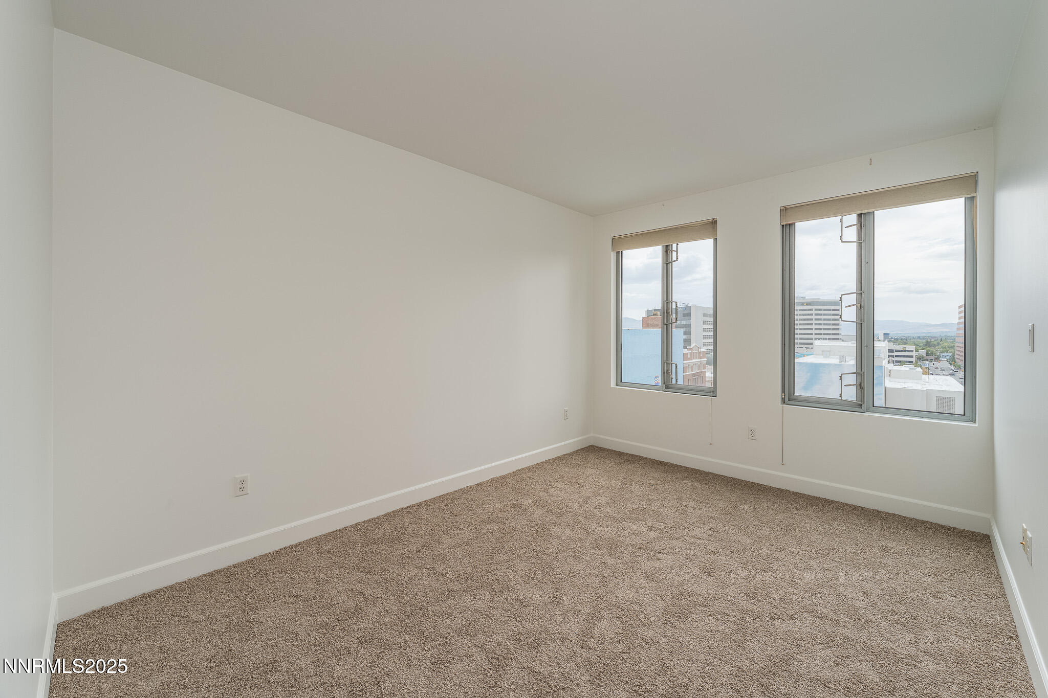 50 North Sierra Street, Unit STE 909 Reno, NV 89501 - Photo 19 of 34 an empty room with windows