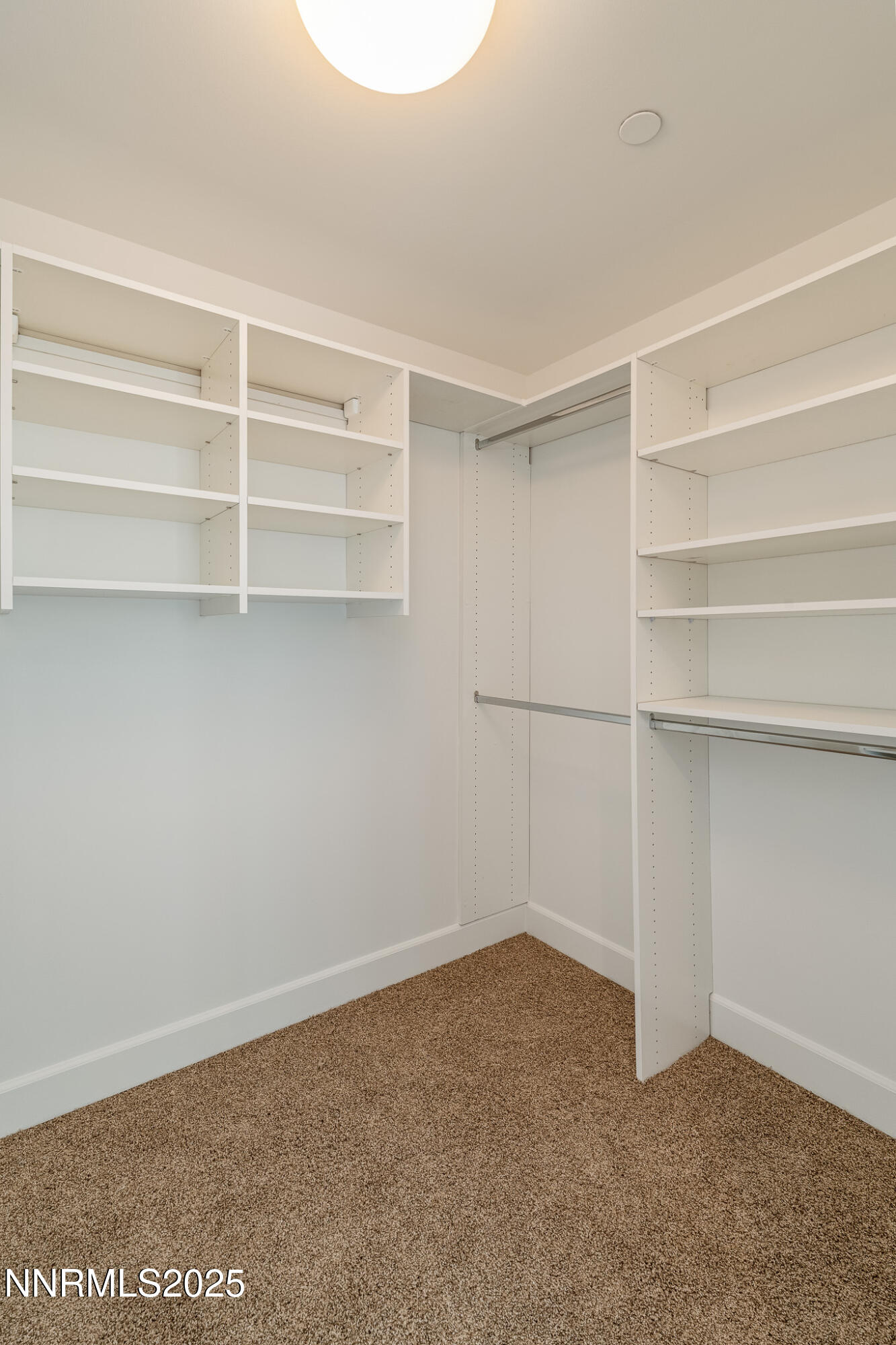 50 North Sierra Street, Unit STE 909 Reno, NV 89501 - Photo 21 of 34 a view of an empty walk in closet