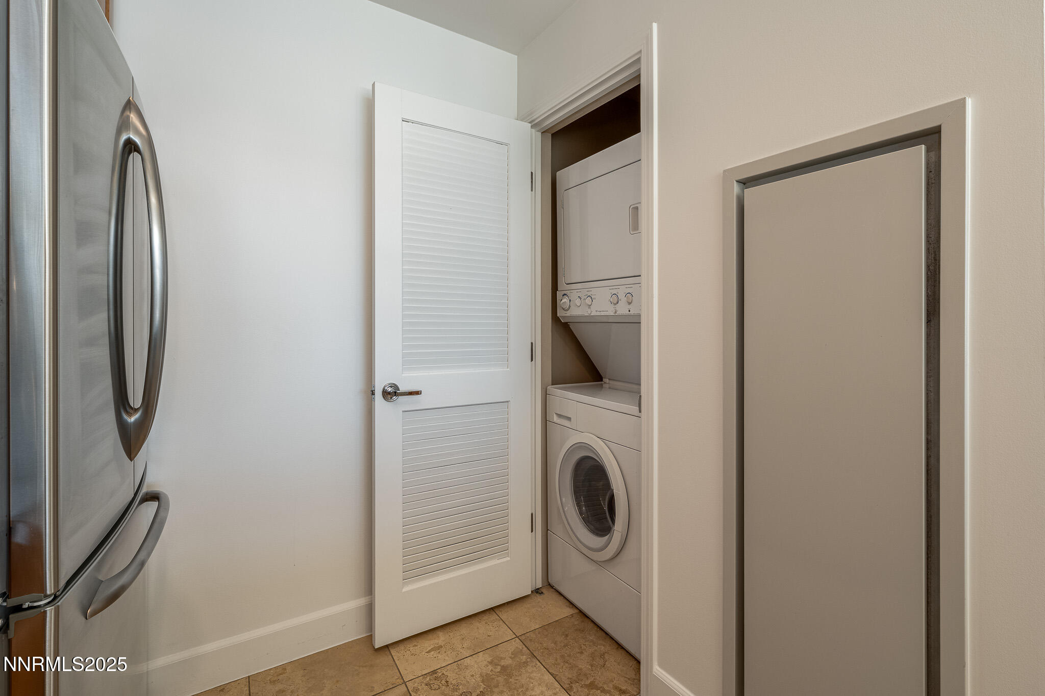 50 North Sierra Street, Unit STE 909 Reno, NV 89501 - Photo 24 of 34 a utility room with dryer and washer