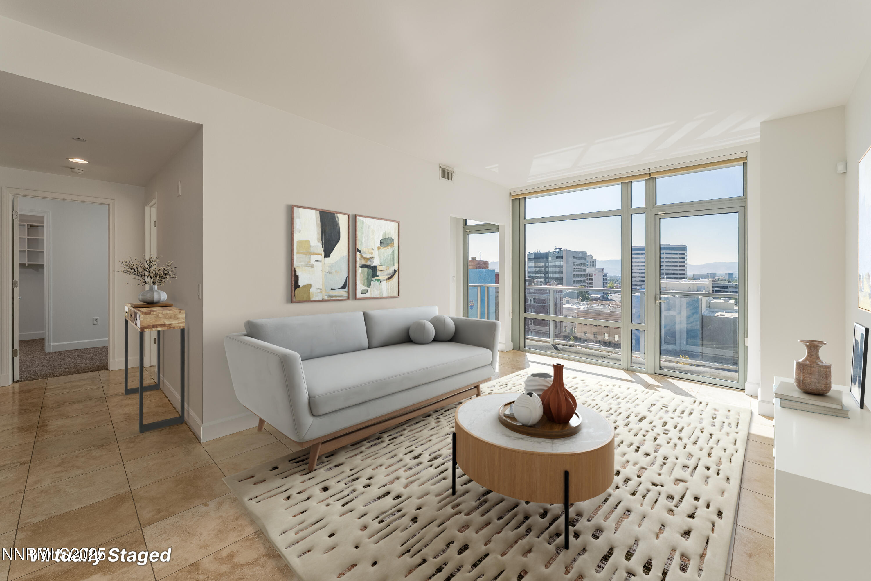 50 North Sierra Street, Unit STE 909 Reno, NV 89501 - Photo 3 of 34 a living room with furniture and a floor to ceiling window