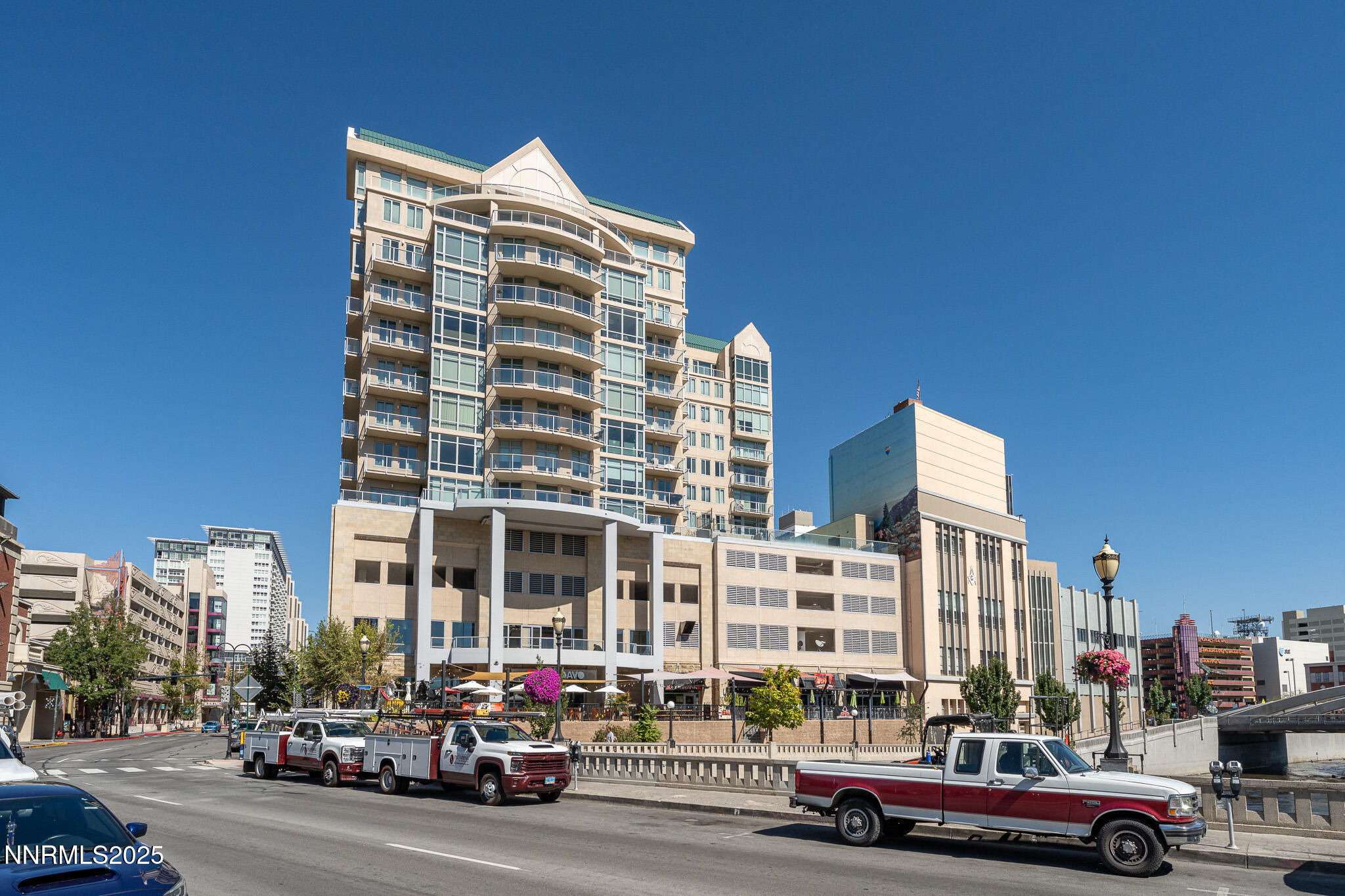 50 North Sierra Street, Unit STE 909 Reno, NV 89501 - Photo 32 of 34 a buildings with car parked in front of it