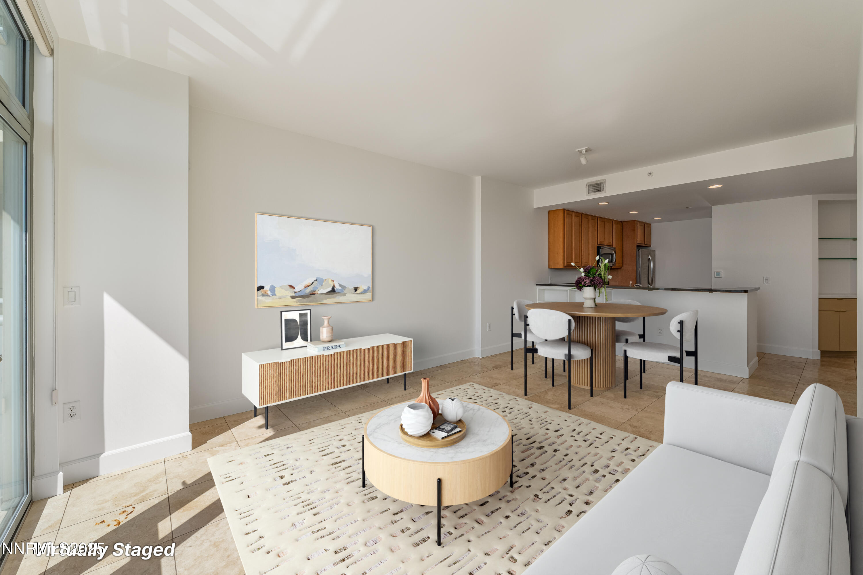 50 North Sierra Street, Unit STE 909 Reno, NV 89501 - Photo 4 of 34 a living room with furniture and a dining room