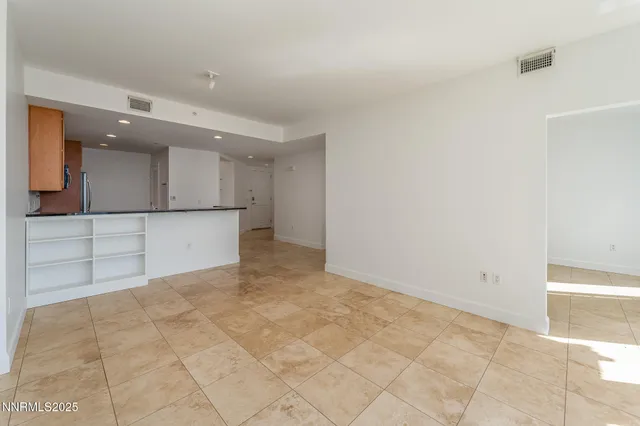a view of kitchen cabinets and appliances
