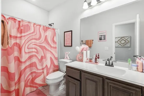 a bathroom with a sink and a toilet