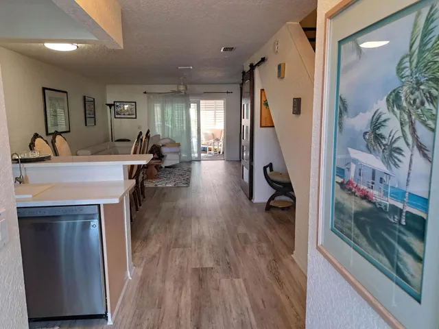 a view of a living room and dining room