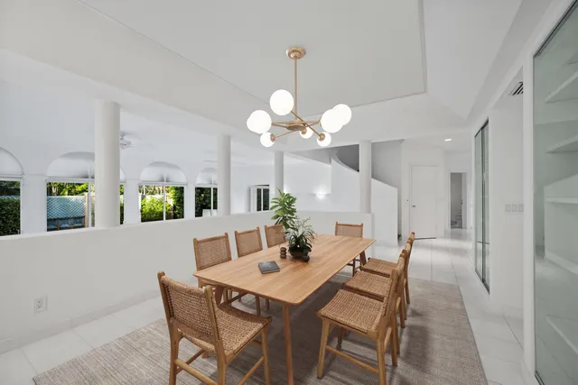 a view of an empty room with windows