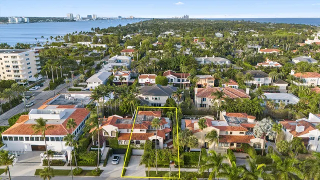 an aerial view of residential building with parking space