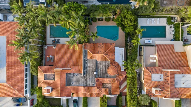a view of a swimming pool with a lake view