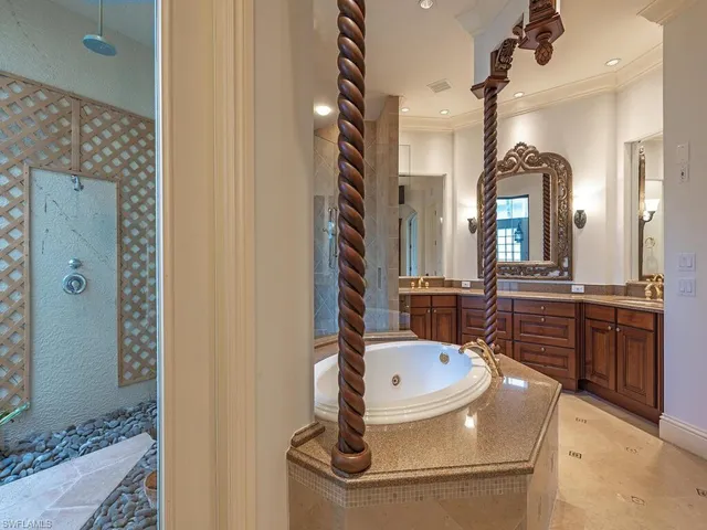 a bathroom with a sink a mirror and a bathtub