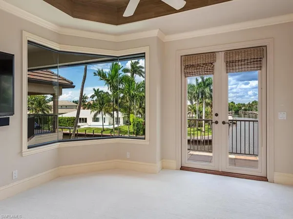 a view of a room with a large window