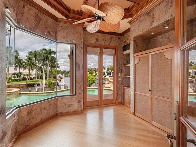 a view of a room with a large window