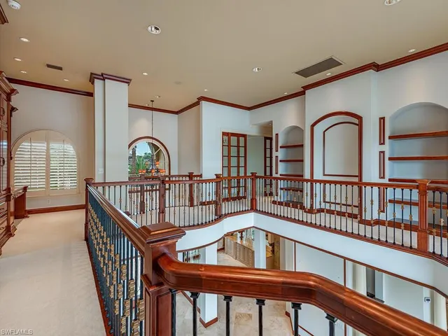 a view of balcony with a large window and wooden deck
