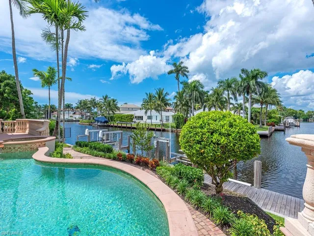 a view of a lake with a garden