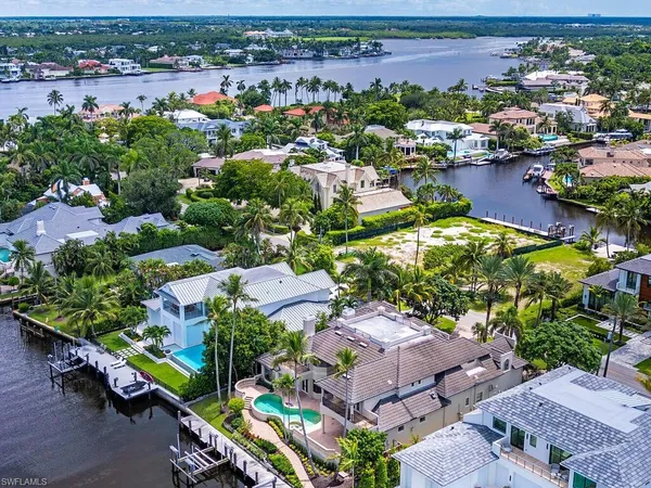 an aerial view of a houses with outdoor space