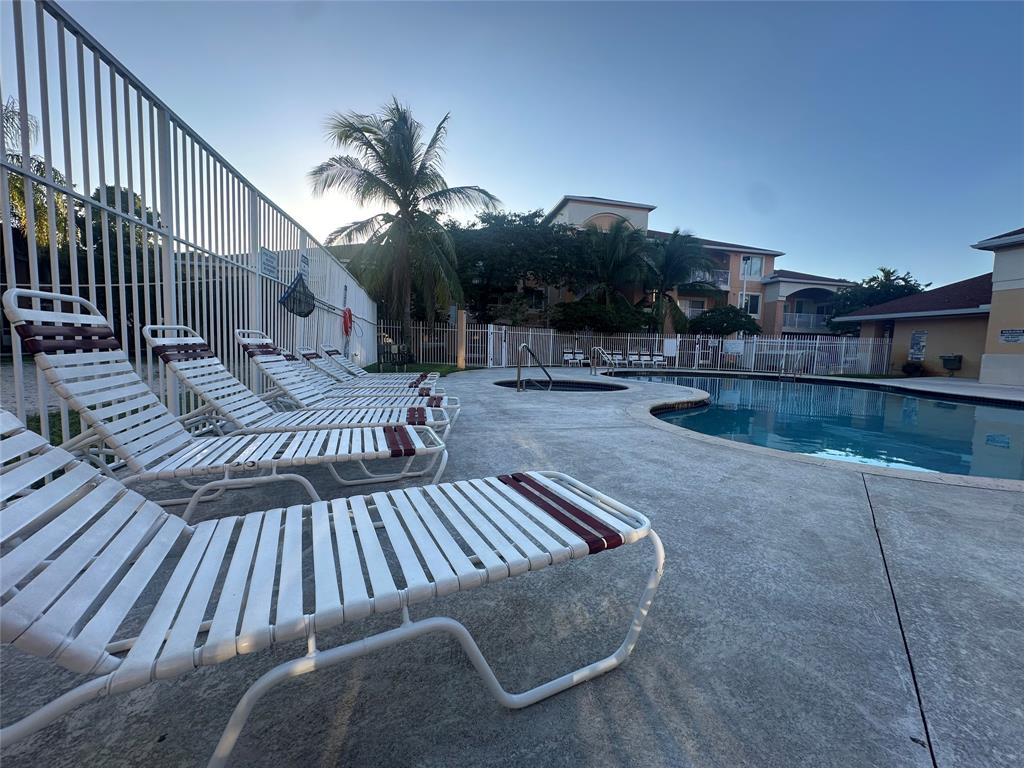 6928 Southwest 39th Street, Unit 207 Fort Lauderdale, FL 33314 - Photo 19 of 21 a view of a terrace with sitting area