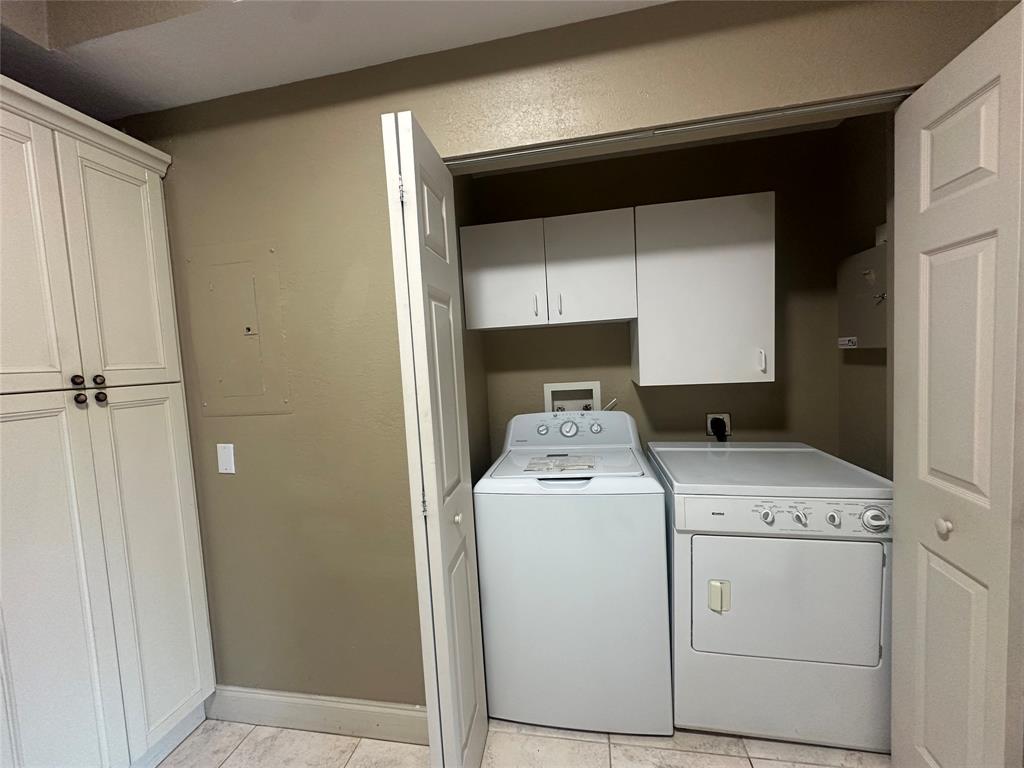 6928 Southwest 39th Street, Unit 207 Fort Lauderdale, FL 33314 - Photo 8 of 21 a utility room with dryer and washer